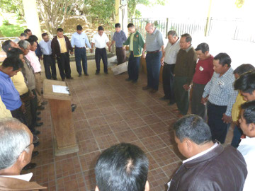 Larry and pastors praying 
together in San Juan La Laguna, Guatemaia