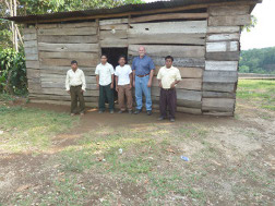 Larry and the team outside a poor rural church